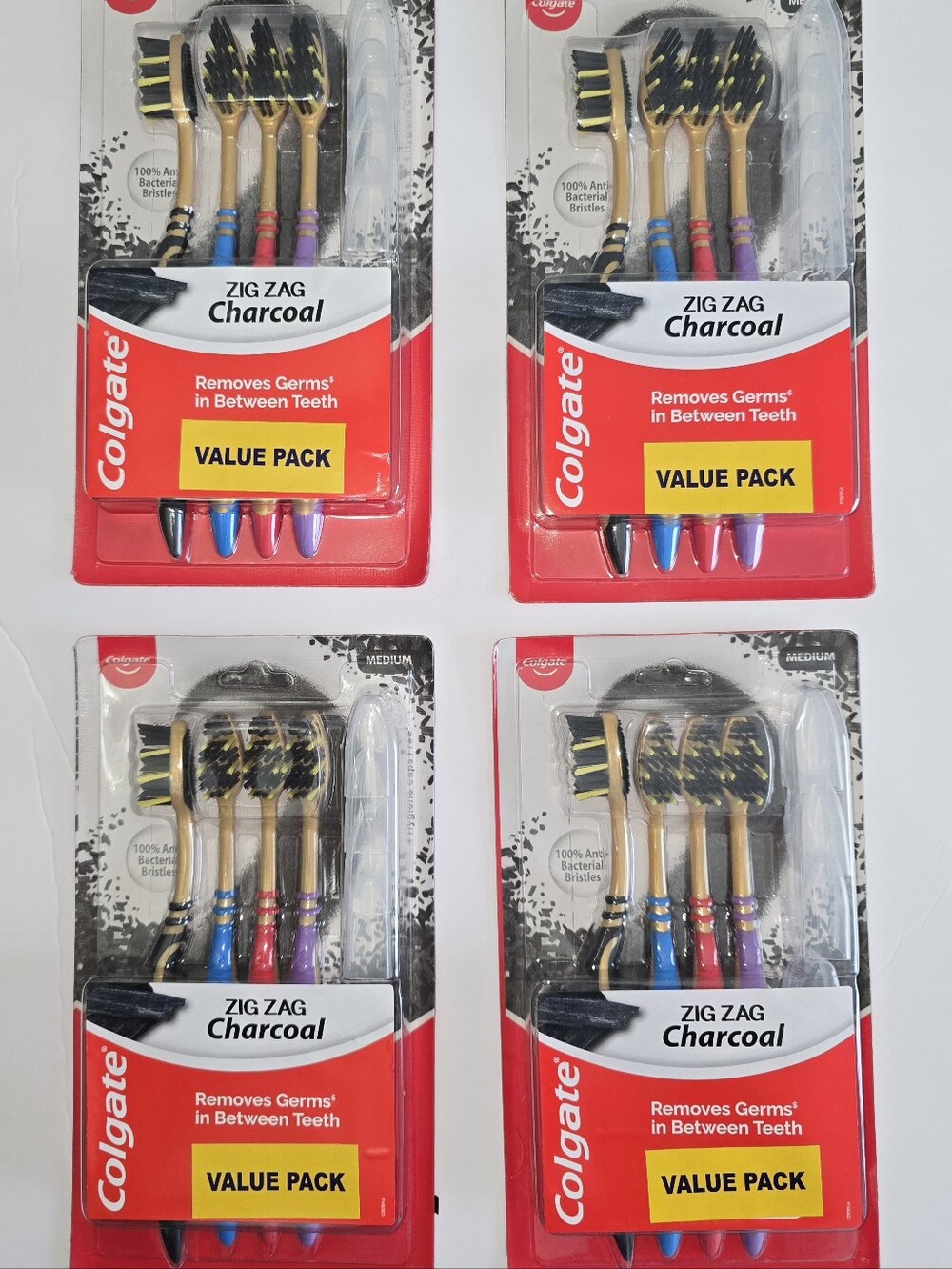 Colgate Zig Zag Charcoal Toothbrush Bundle – 4 Packs (16 Toothbrushes Total)